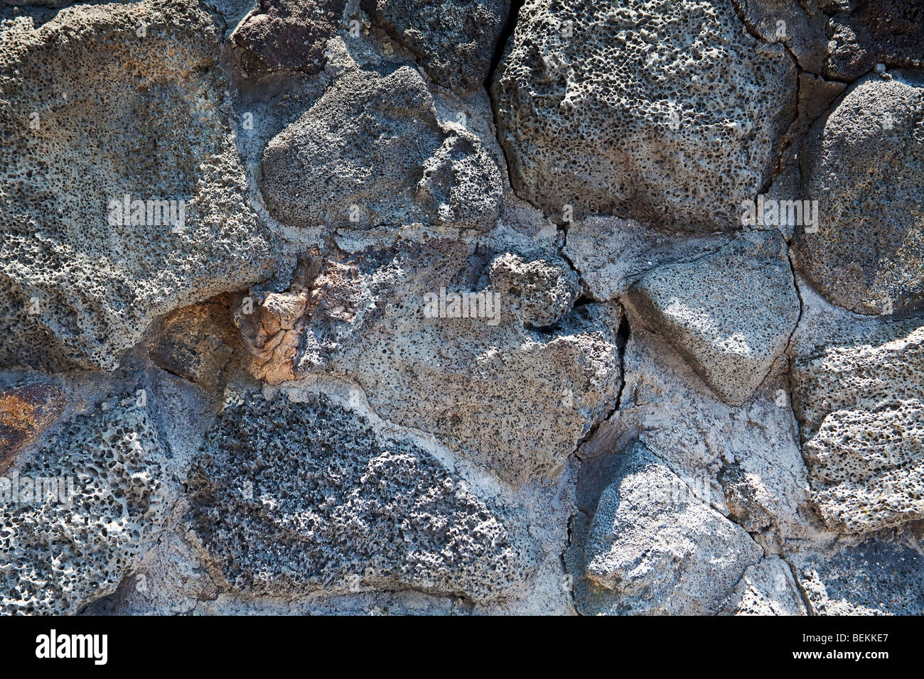 Hawaiian Black lava rock wall background Banque D'Images