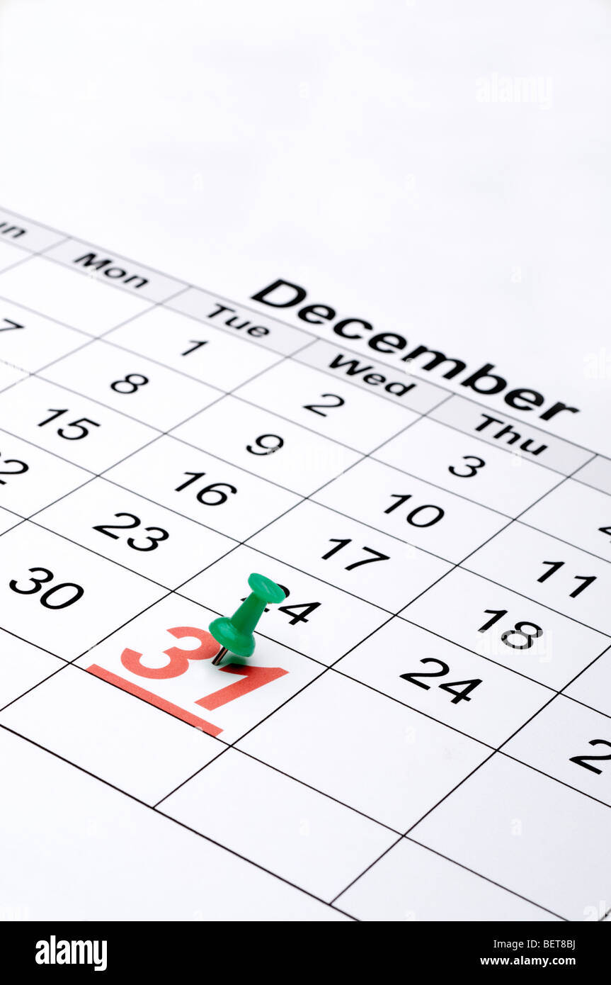 Vertical image d'un calendrier avec le jour de l'an marqués d'un point vert Banque D'Images
