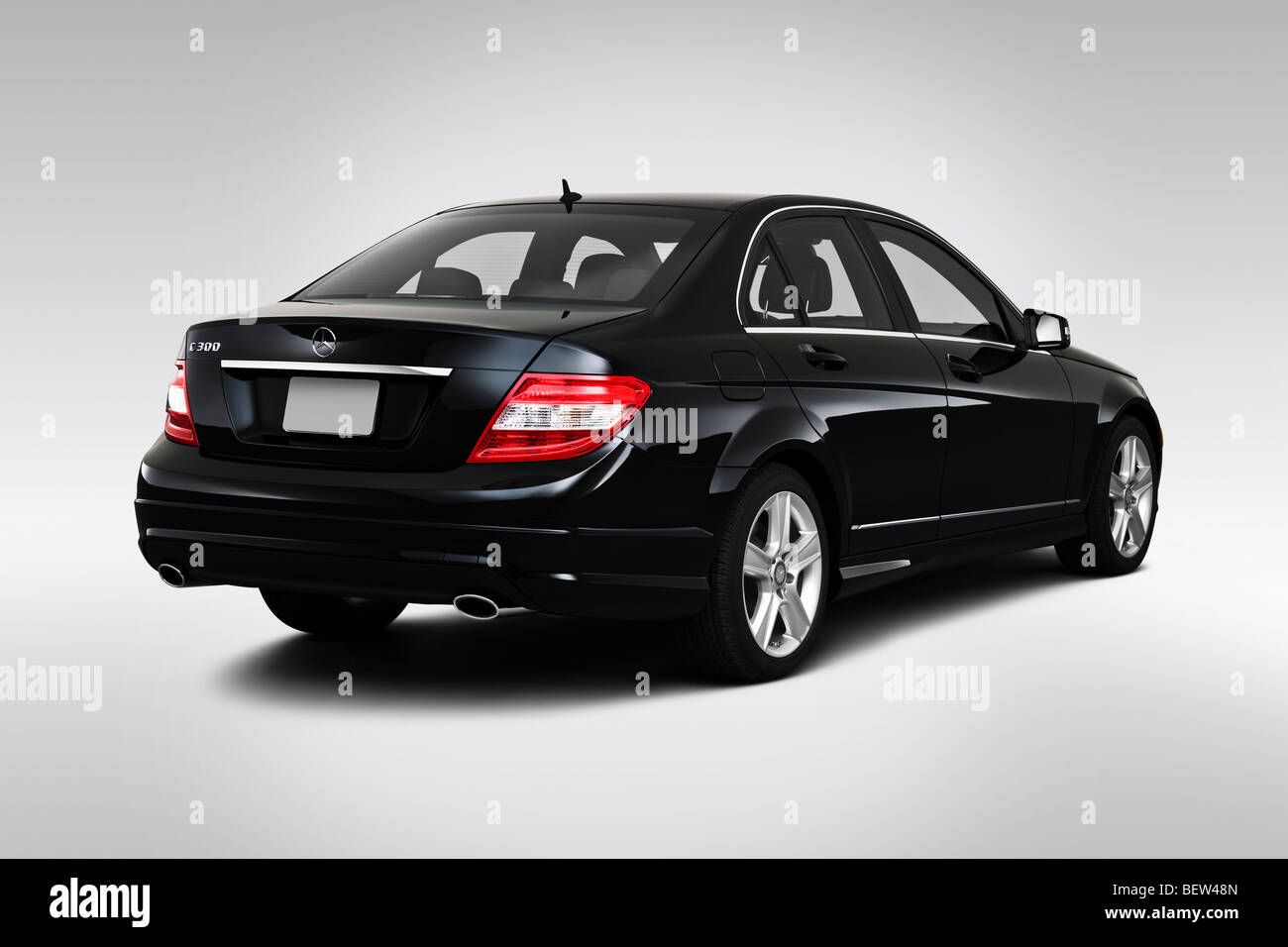 2010 Mercedes-Benz C-Class C300 en noir - vue d'angle arrière Banque D'Images