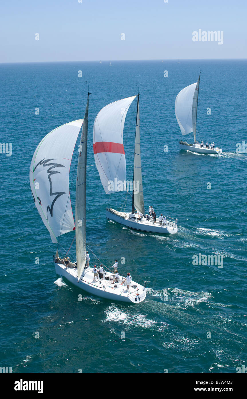 Trois bateaux en compétition dans l'équipe événement nautique, en Californie Banque D'Images