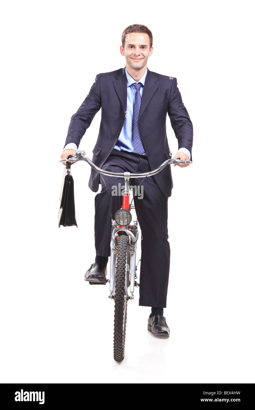 Happy businessman riding a bike, isolé sur fond blanc Banque D'Images
