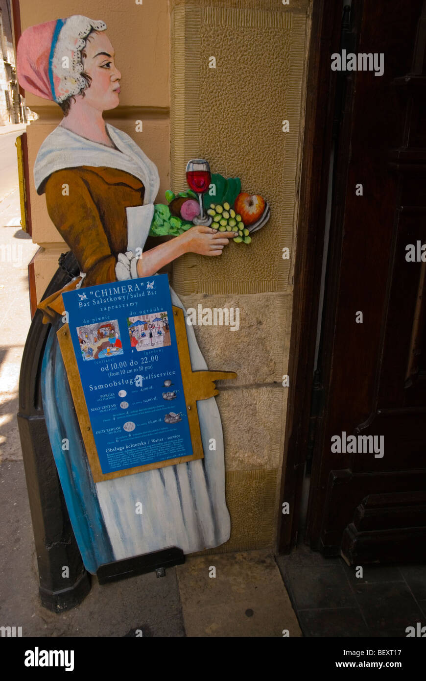 Restaurant sign old town Krakow Pologne Europe Banque D'Images