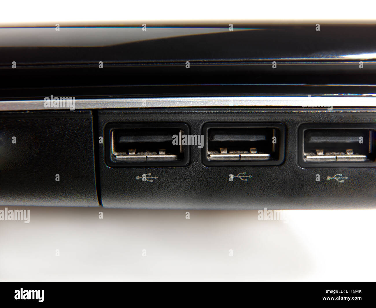 Montrant les ports USB (Universal Serial Bus) Symbole Trident pour connecter les périphériques informatiques Banque D'Images
