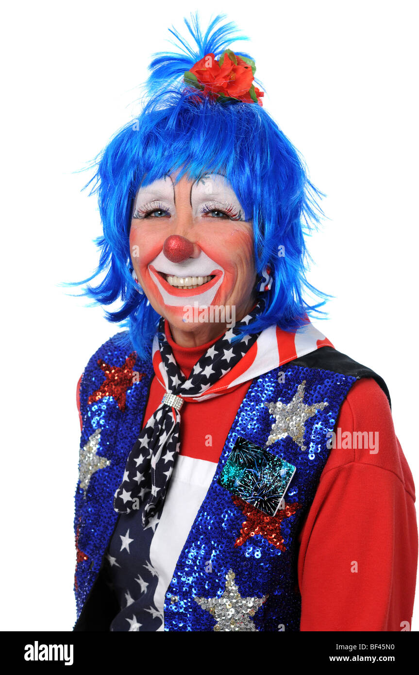 Clown vêtu de rouge, blanc et bleu smiling Banque D'Images