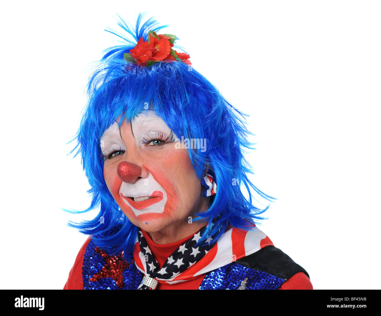 Portrait de clown vêtu de rouge, blanc et bleu Banque D'Images