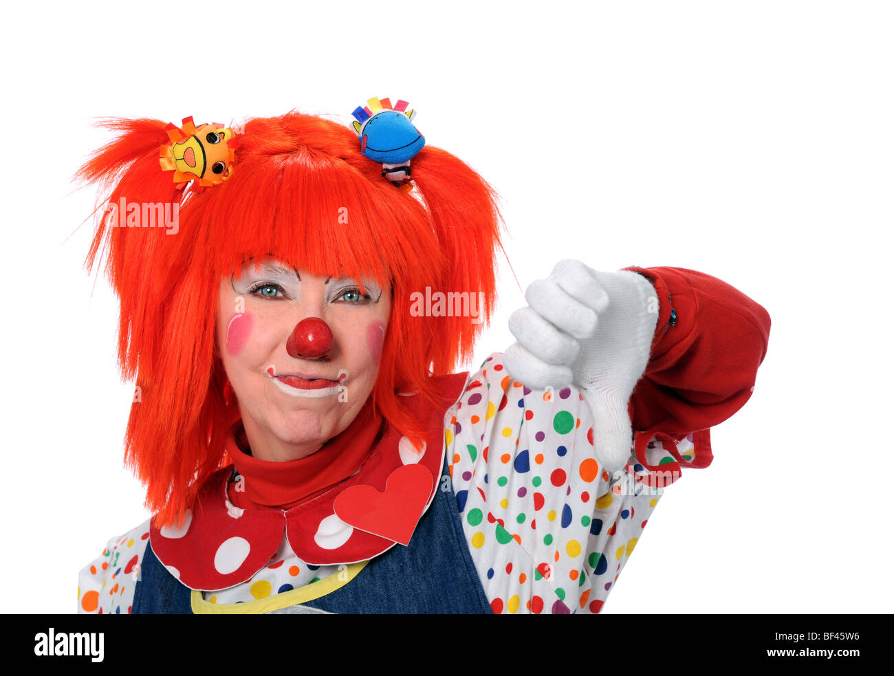 Clown à cheveux orange montrant sa désapprobation Banque D'Images