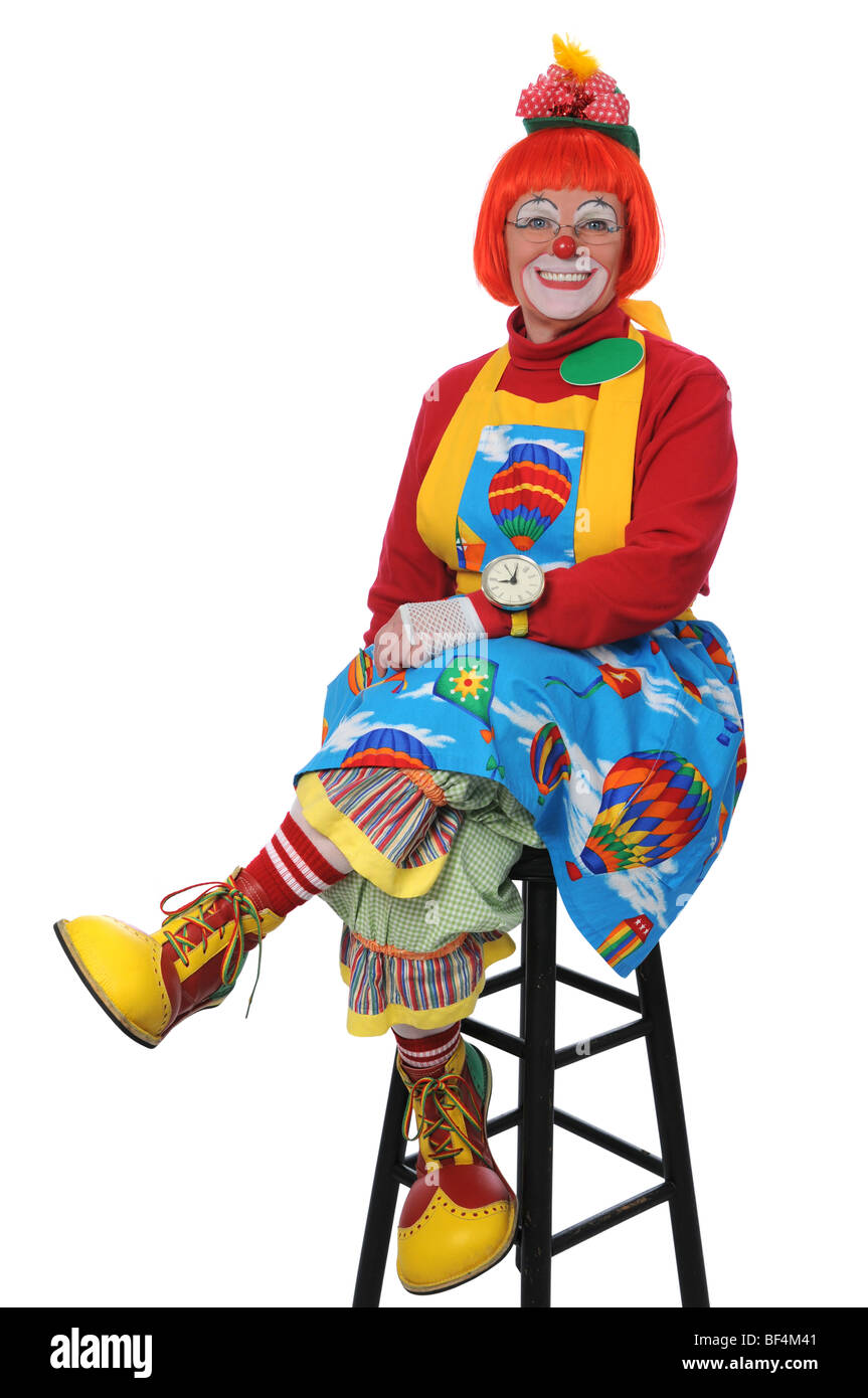 CLown sitting and smiling isolé sur fond blanc Banque D'Images