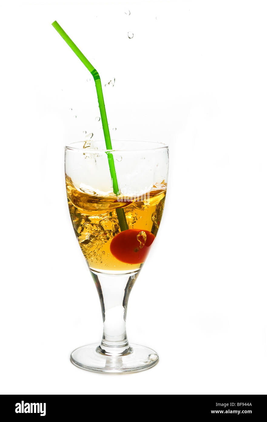 Verre avec un liquide jaune Banque D'Images