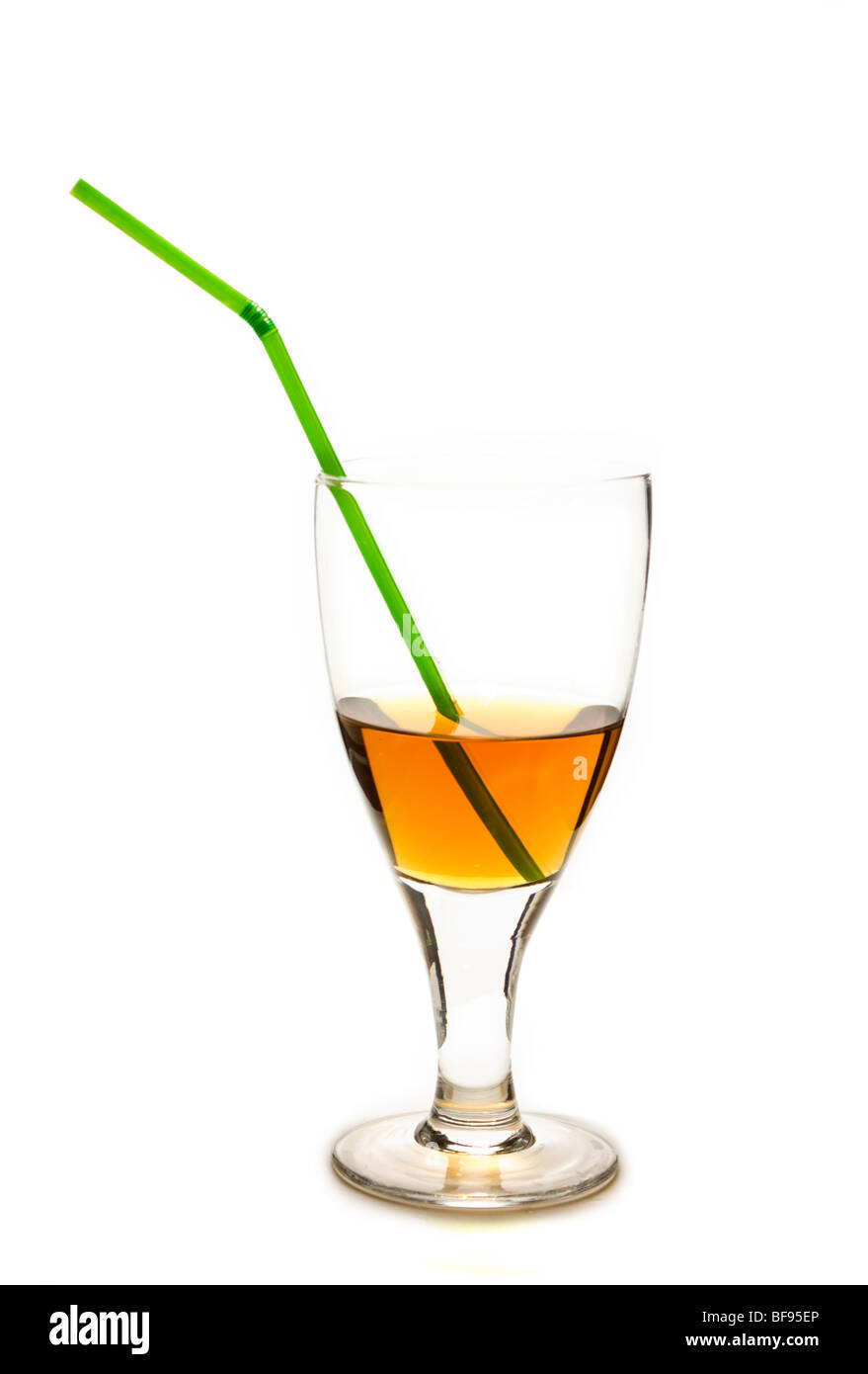 Verre avec un liquide jaune Banque D'Images