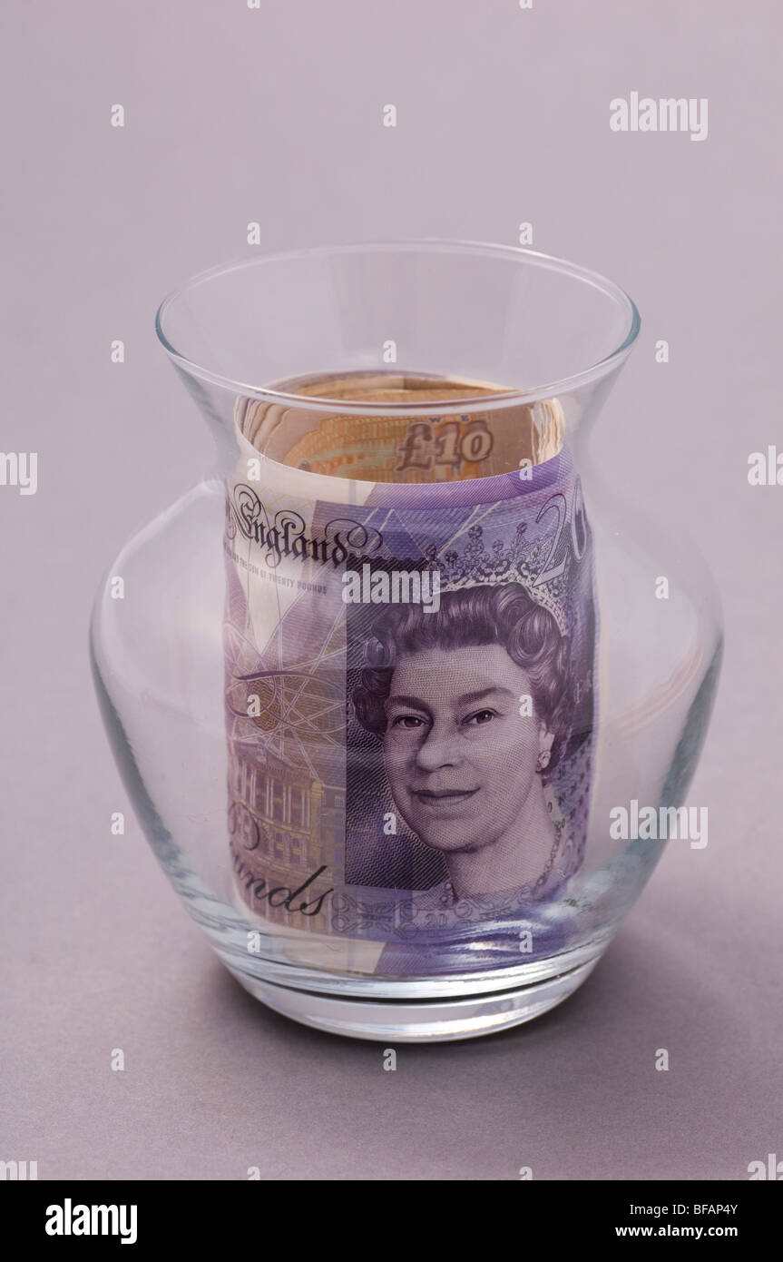 La monnaie britannique dans un bocal en verre Banque D'Images
