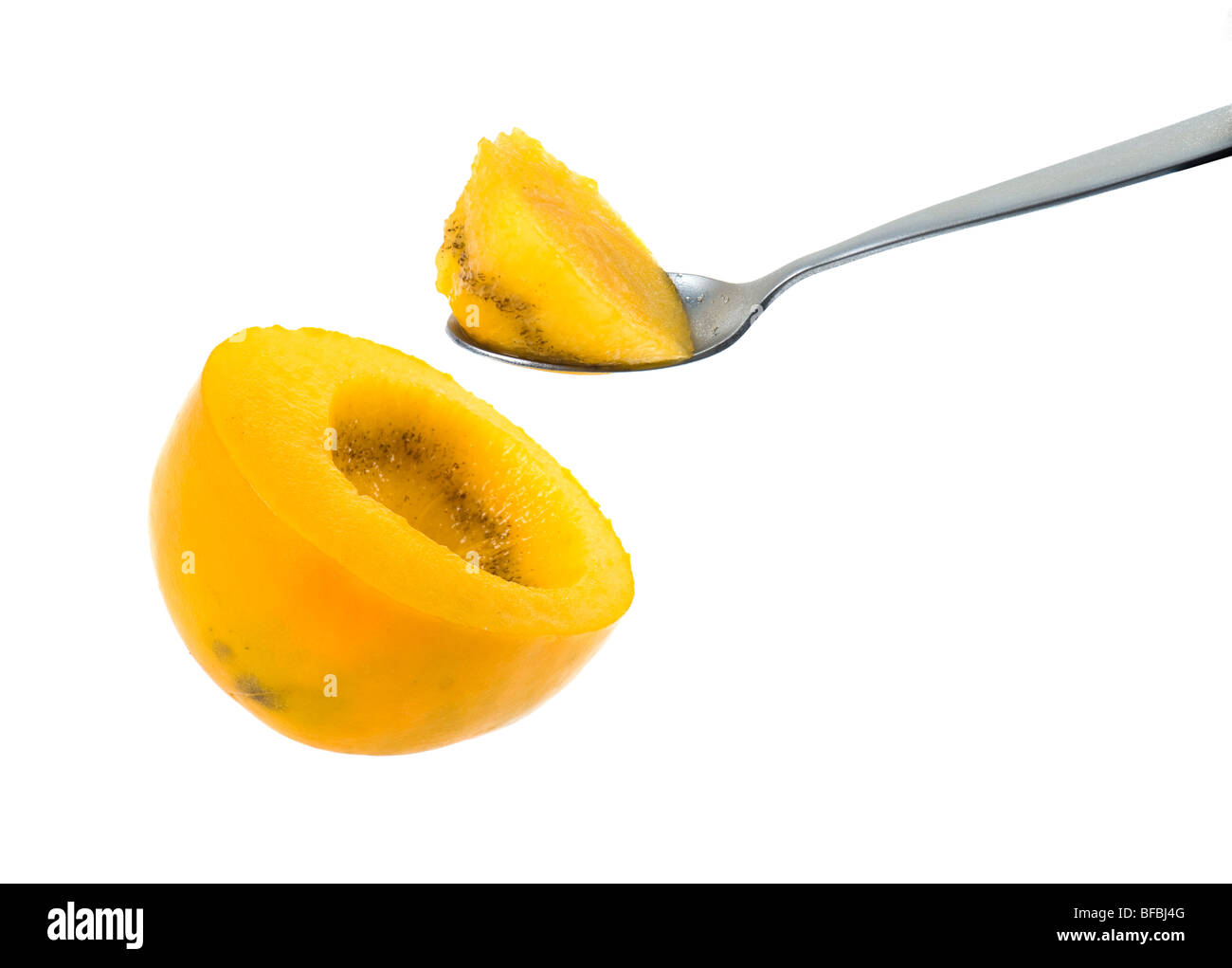 Manger Manger kaki kaki Diospyros kaki Sharon fruit persimone Ebenaceae Japanese persimmon Diospyros Kakifruit découpe cuillère Banque D'Images