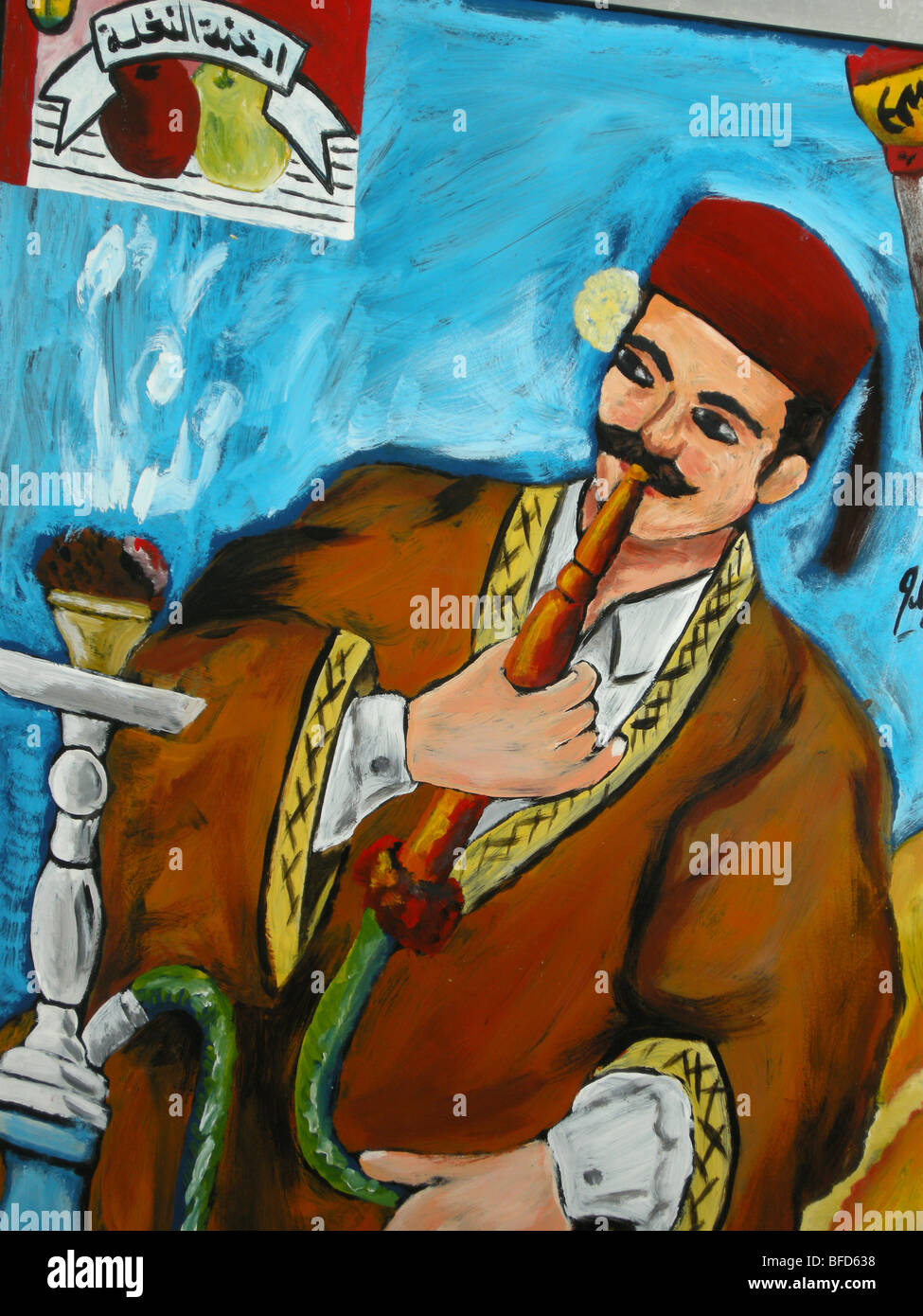 Tableau peint d'un homme en vêtements tunisiens fumer une pipe narguilé Banque D'Images
