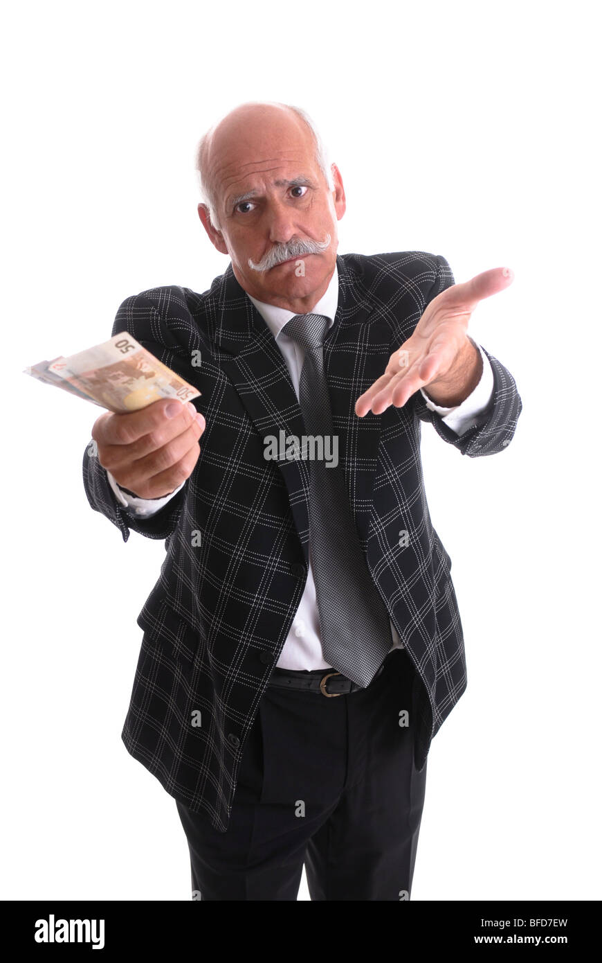 Pensionné de la détention de monnaie dans sa main Banque D'Images