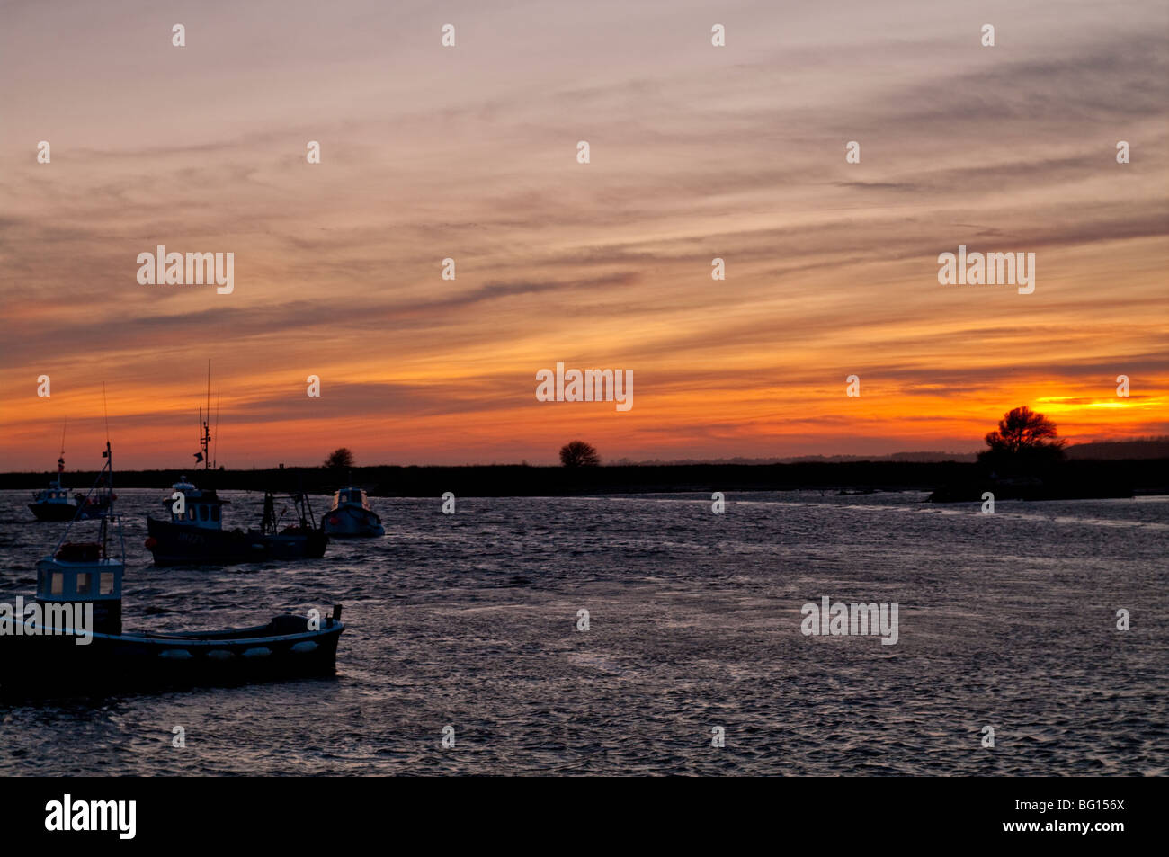 Coucher de soleil depuis le quai d'Orford, Suffolk, Angleterre Banque D'Images