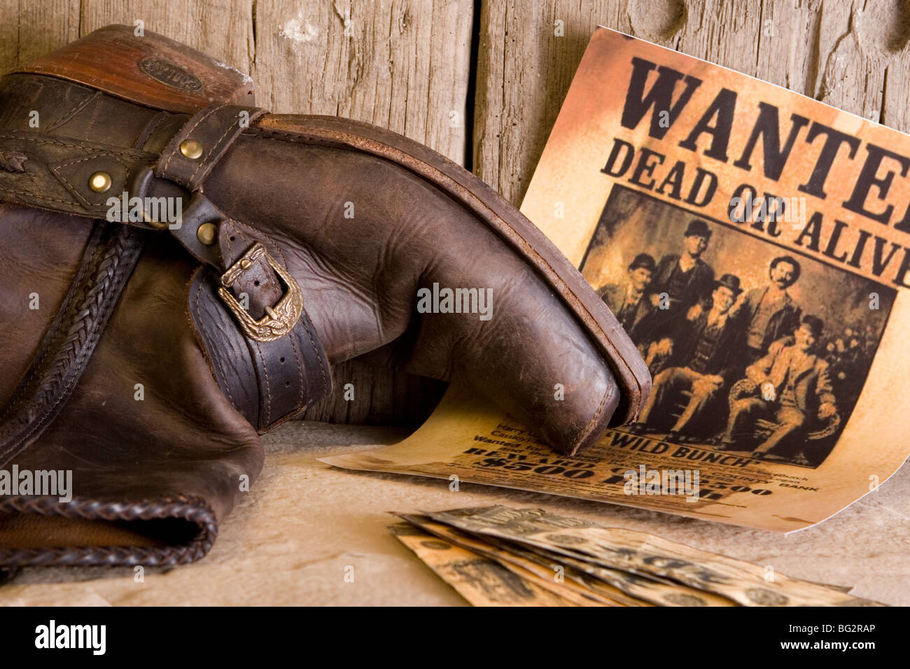 Bottes et des dollars américains de wild west voulait hors-la-loi Banque D'Images