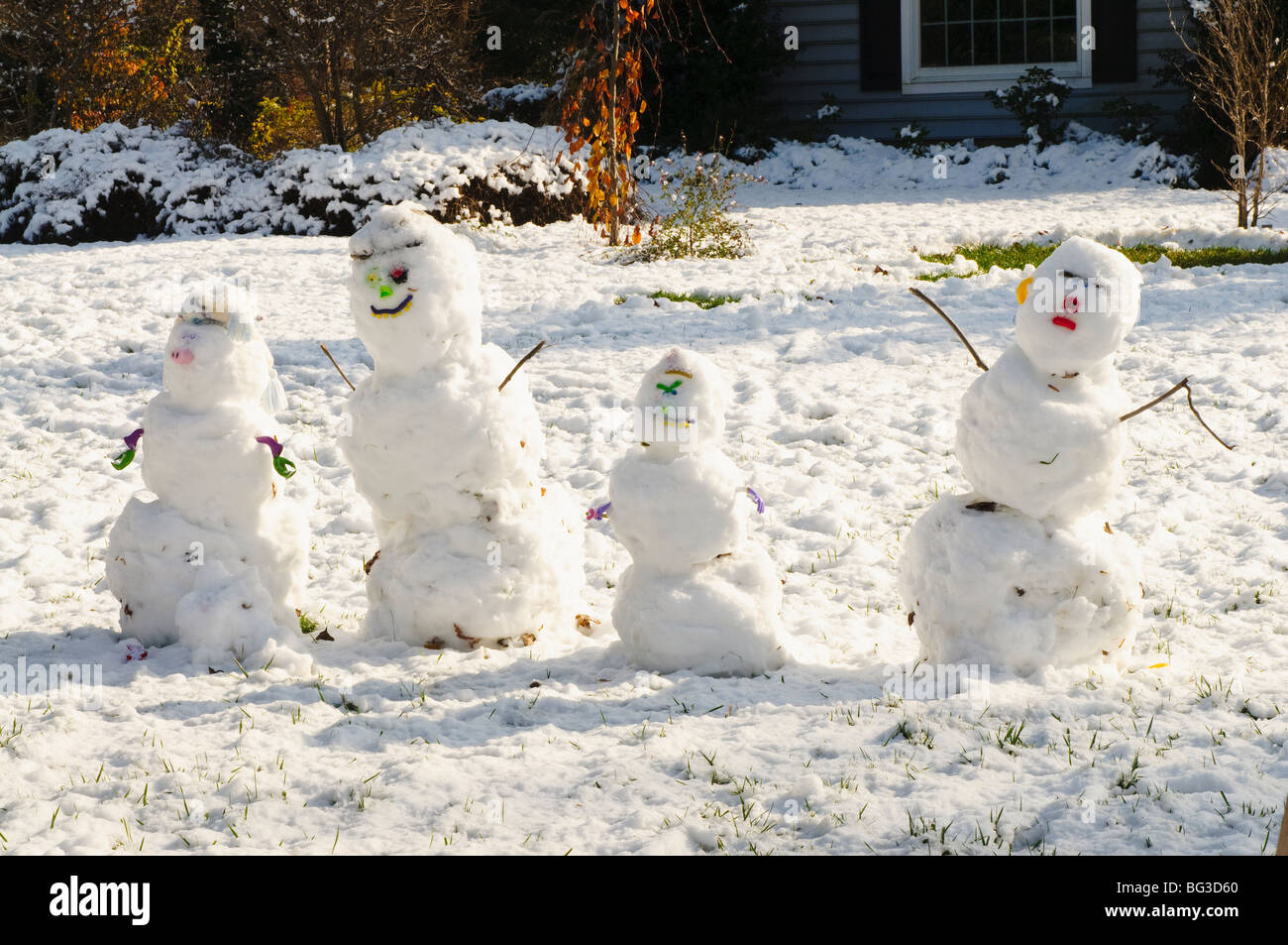 Quatre bonhommes de neige Banque de photographies et d’images à haute