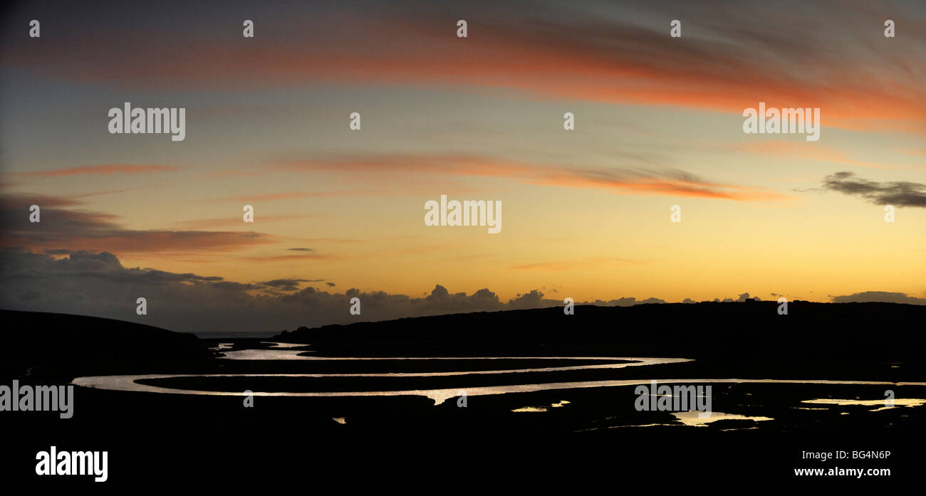 Cuckmere Rivière au coucher du soleil. Sussex, Angleterre Banque D'Images