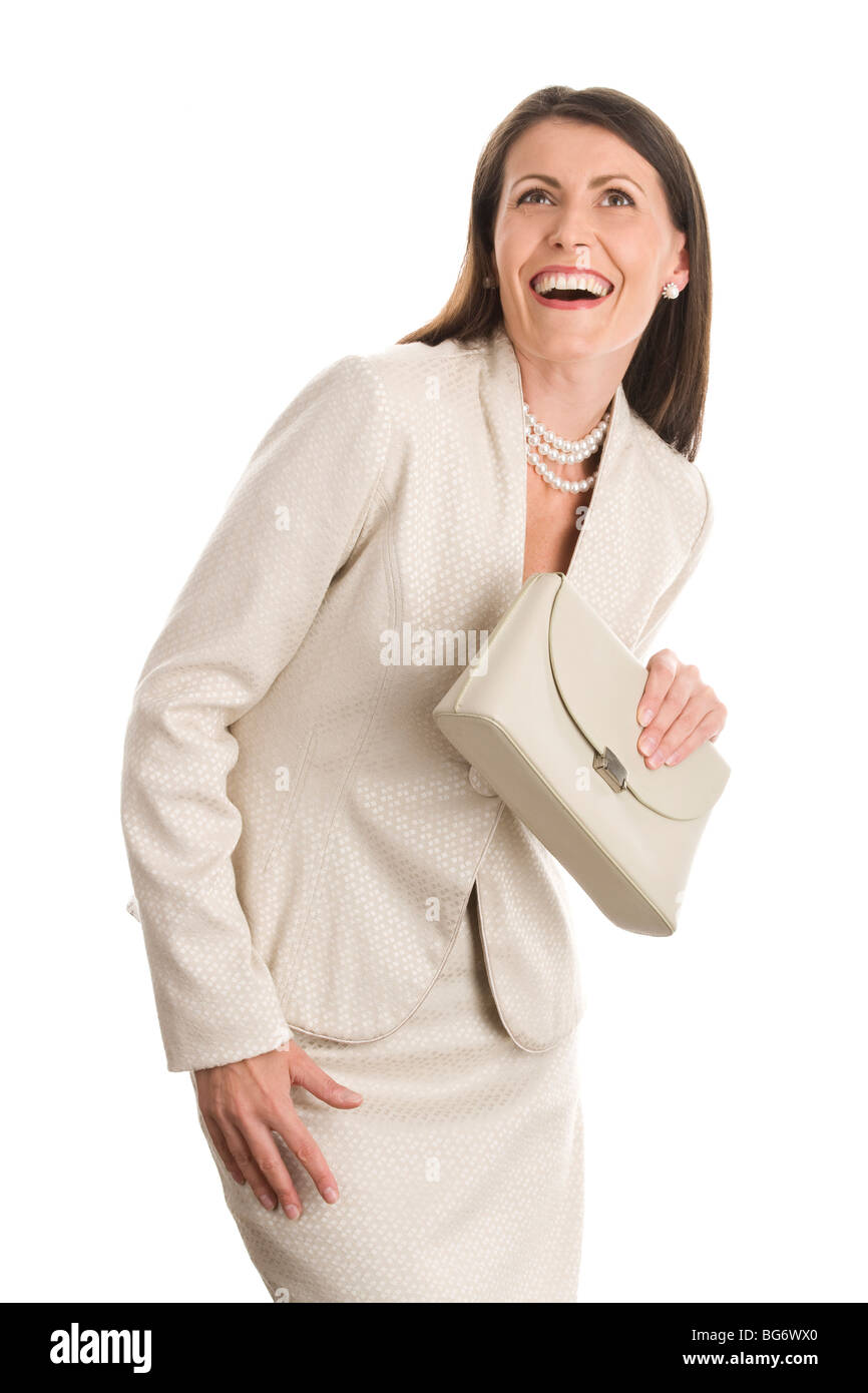 Portrait of mature elegant woman laughing isolé sur fond blanc Banque D'Images