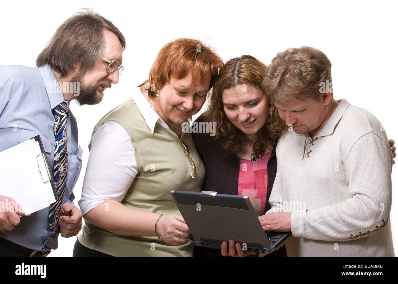 Équipe de quatre business people à l'écran à l'ordinateur portable de sur fond blanc Banque D'Images