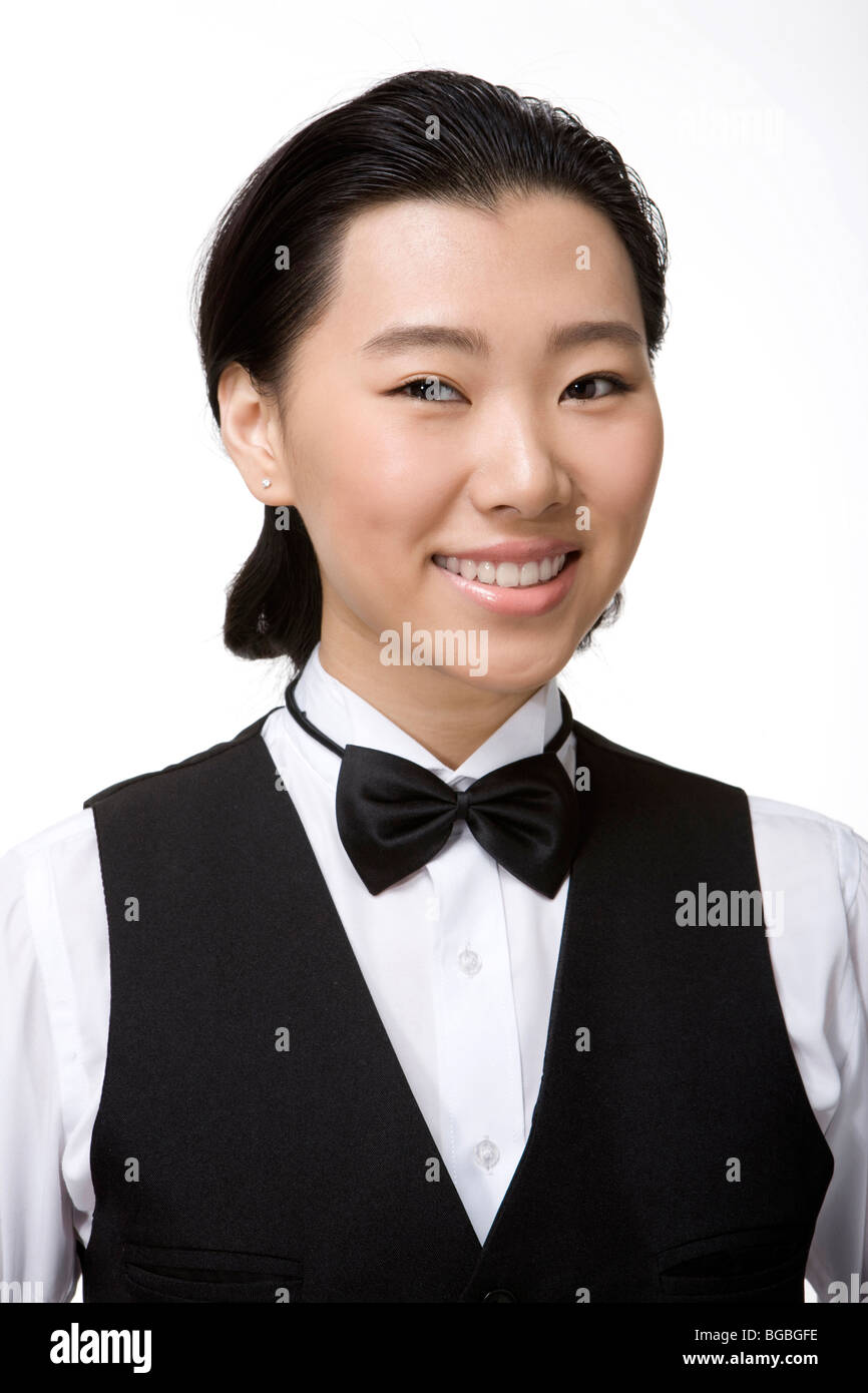 Le personnel de service souriant Banque D'Images