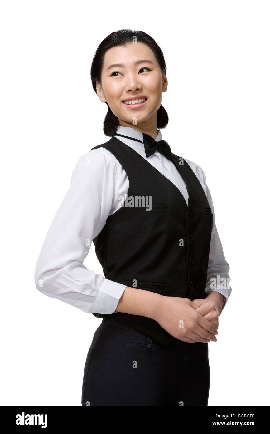 Le personnel de service souriant Banque D'Images