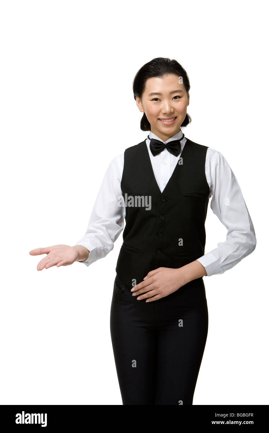 Le personnel de service souriant Banque D'Images