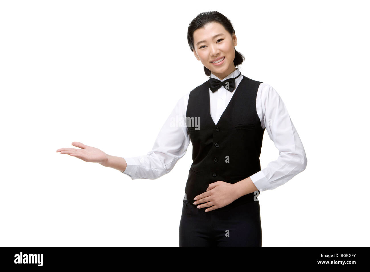 Le personnel de service souriant Banque D'Images