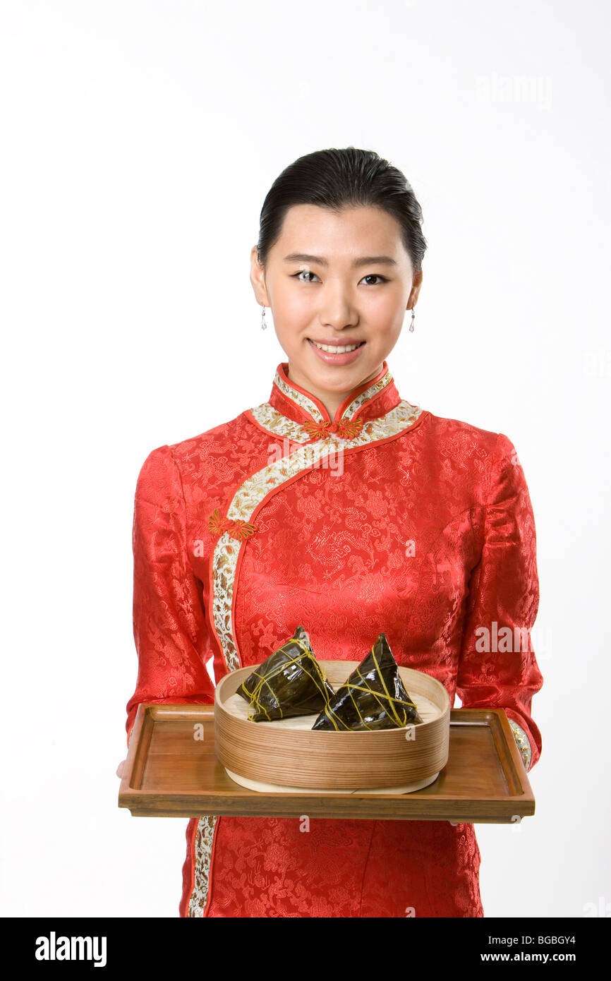 Leaf-Wrapped Dumnplings comptable serveur Banque D'Images