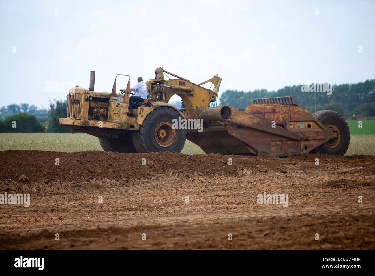 Scrapper terre Caterpillar Banque D'Images