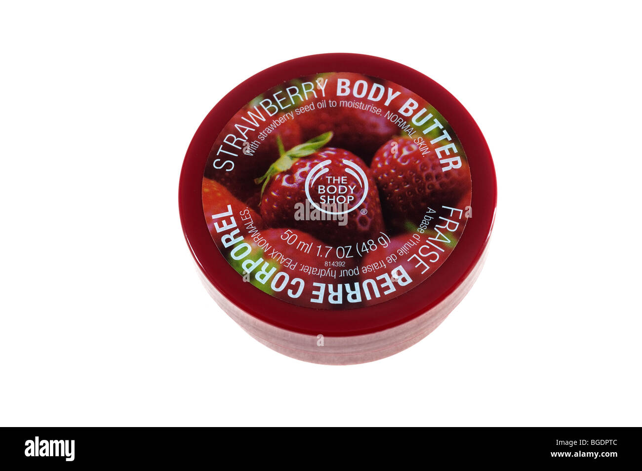 50ml contenant de plastique rouge de 'Body Shop' Beurre Corporel Fraise Banque D'Images