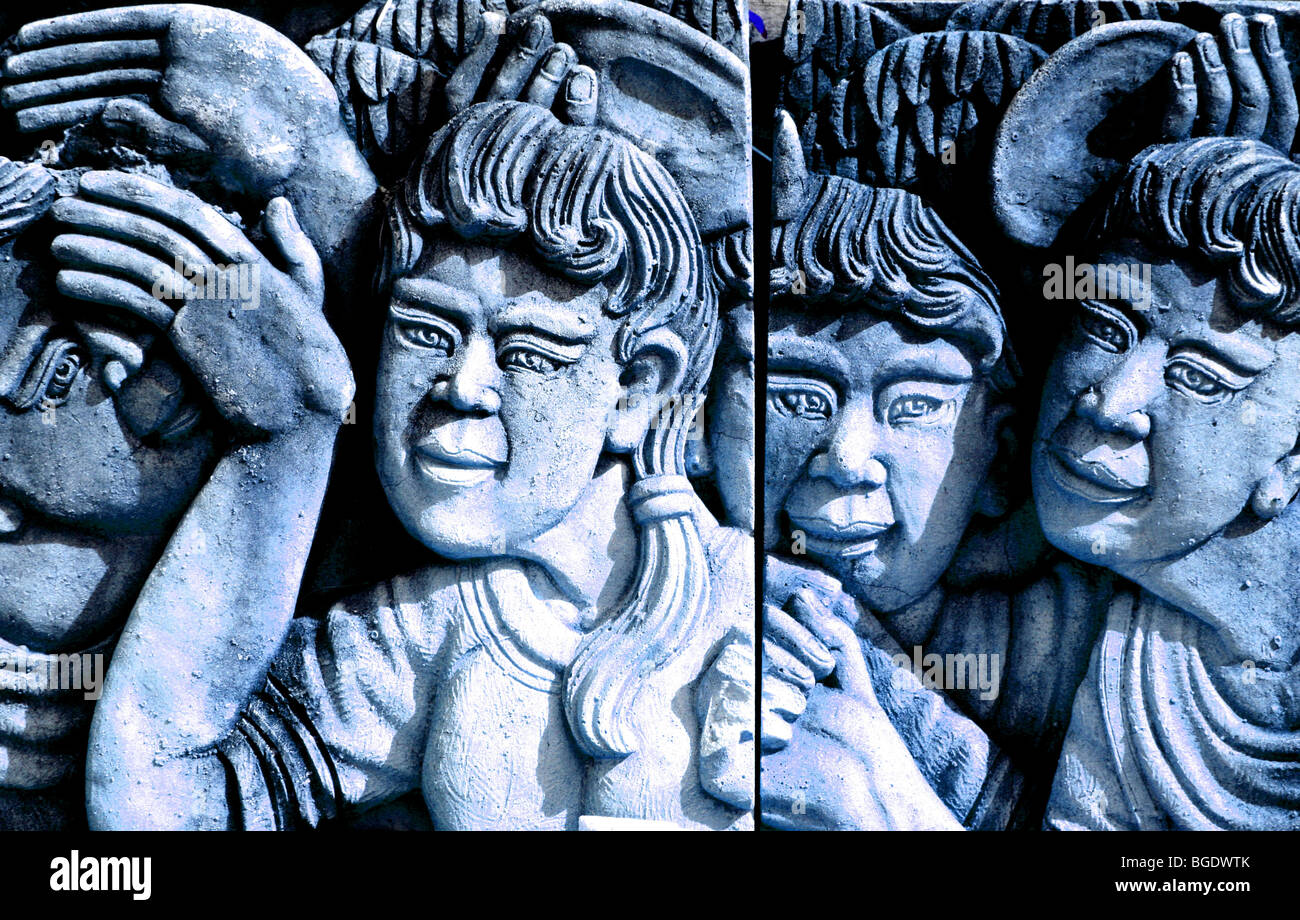 Dames et Hommes thaïlandais sculpté dans la pierre pour un jardin, la Thaïlande. Banque D'Images