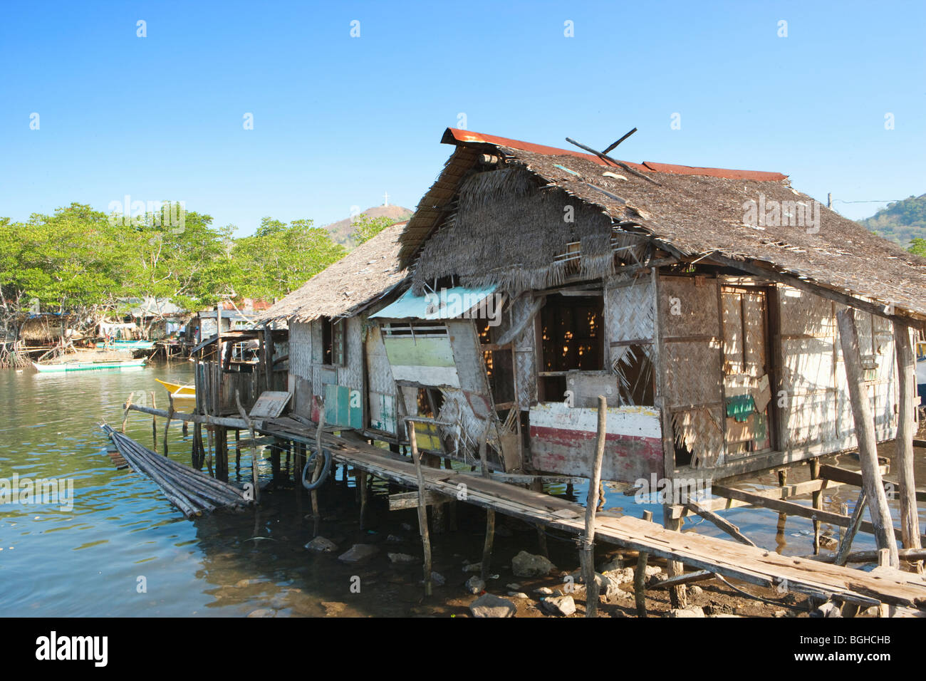 Guindé maisons de pêcheurs ; ville ; l'Île Coron Busuanga, Philippines Banque D'Images