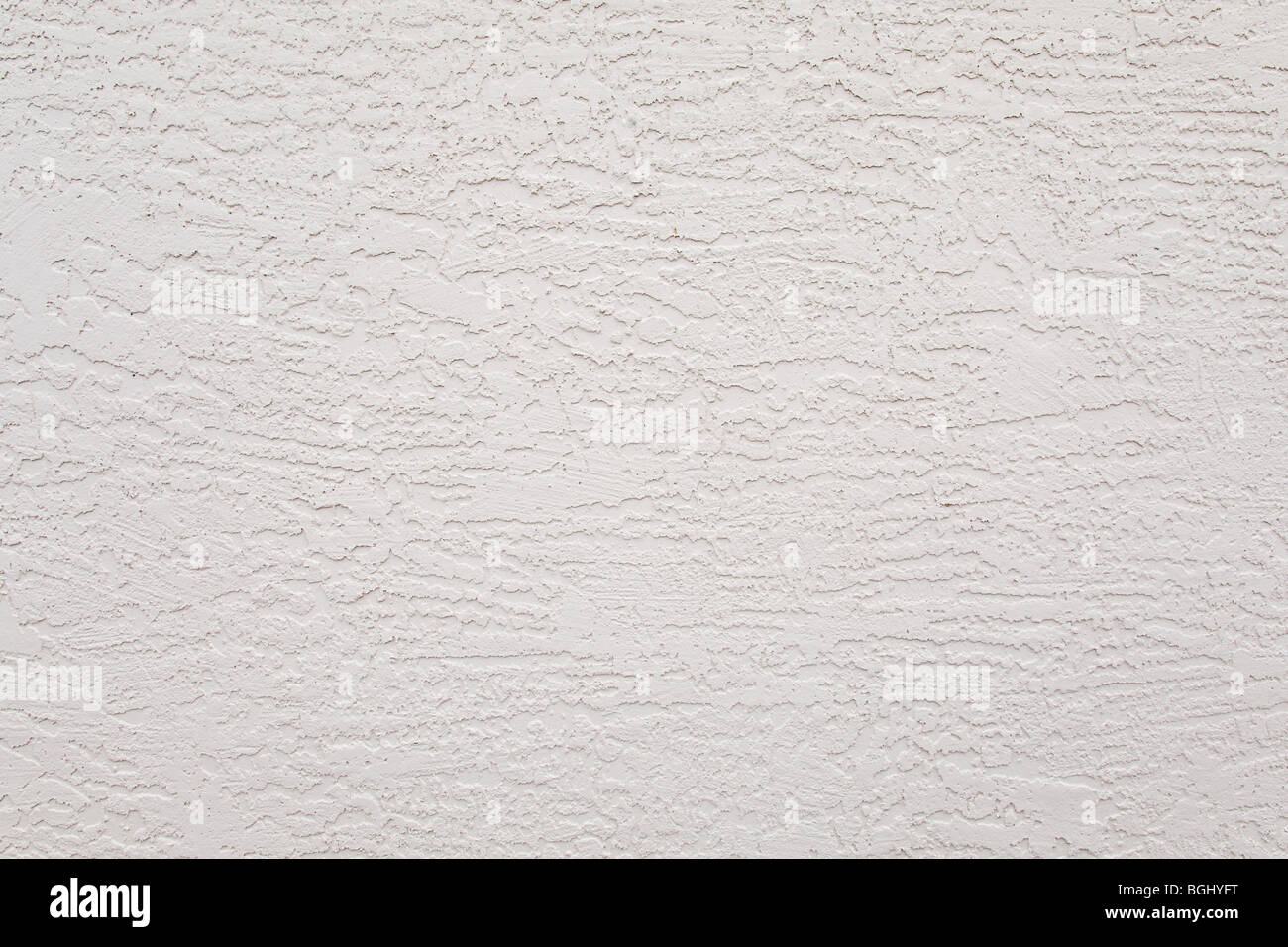 Mur extérieur en stuc blanc motif rugueux Banque D'Images