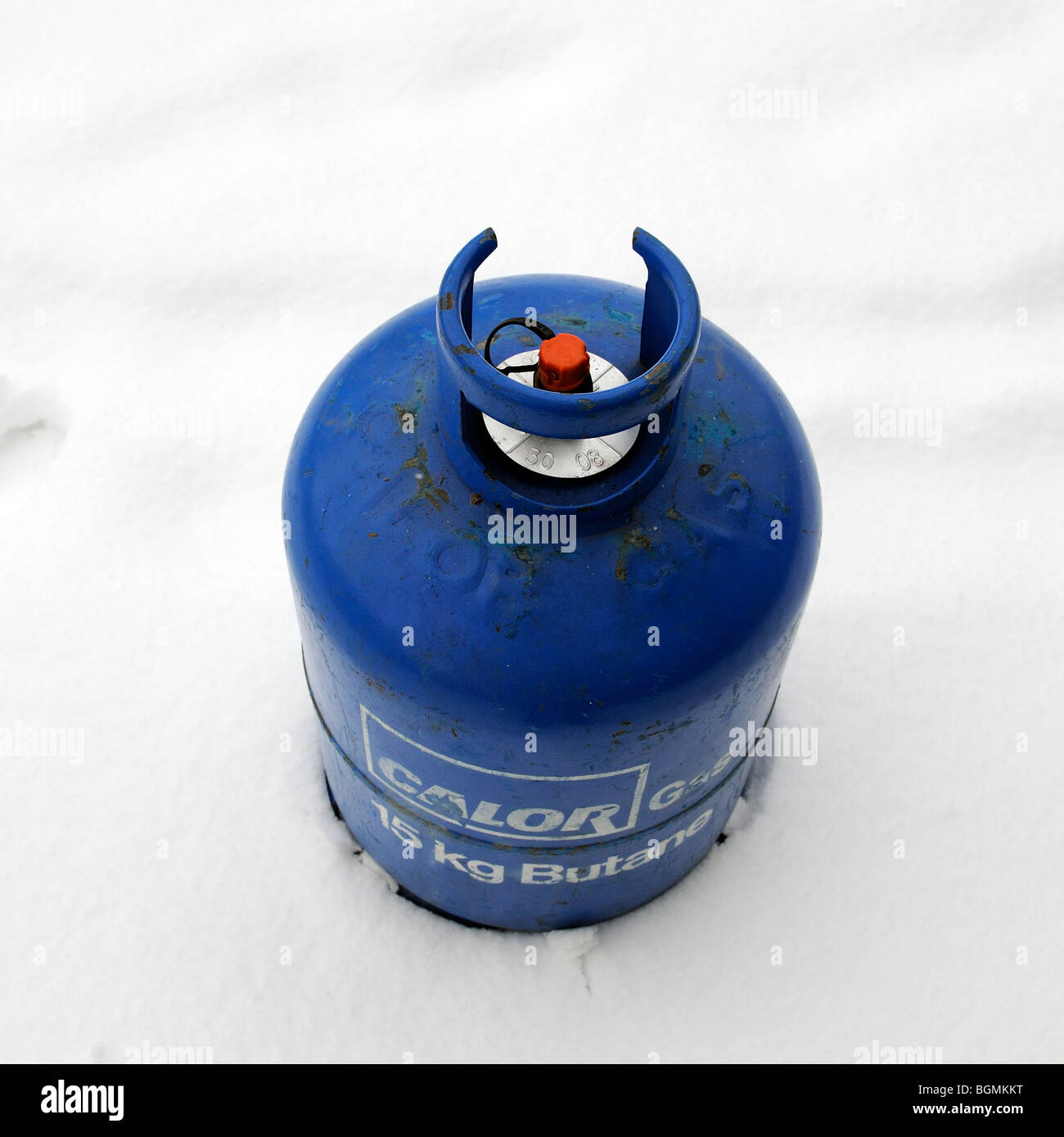Calor Gas Company bouteille de gaz butane bouteille debout dans la neige Banque D'Images