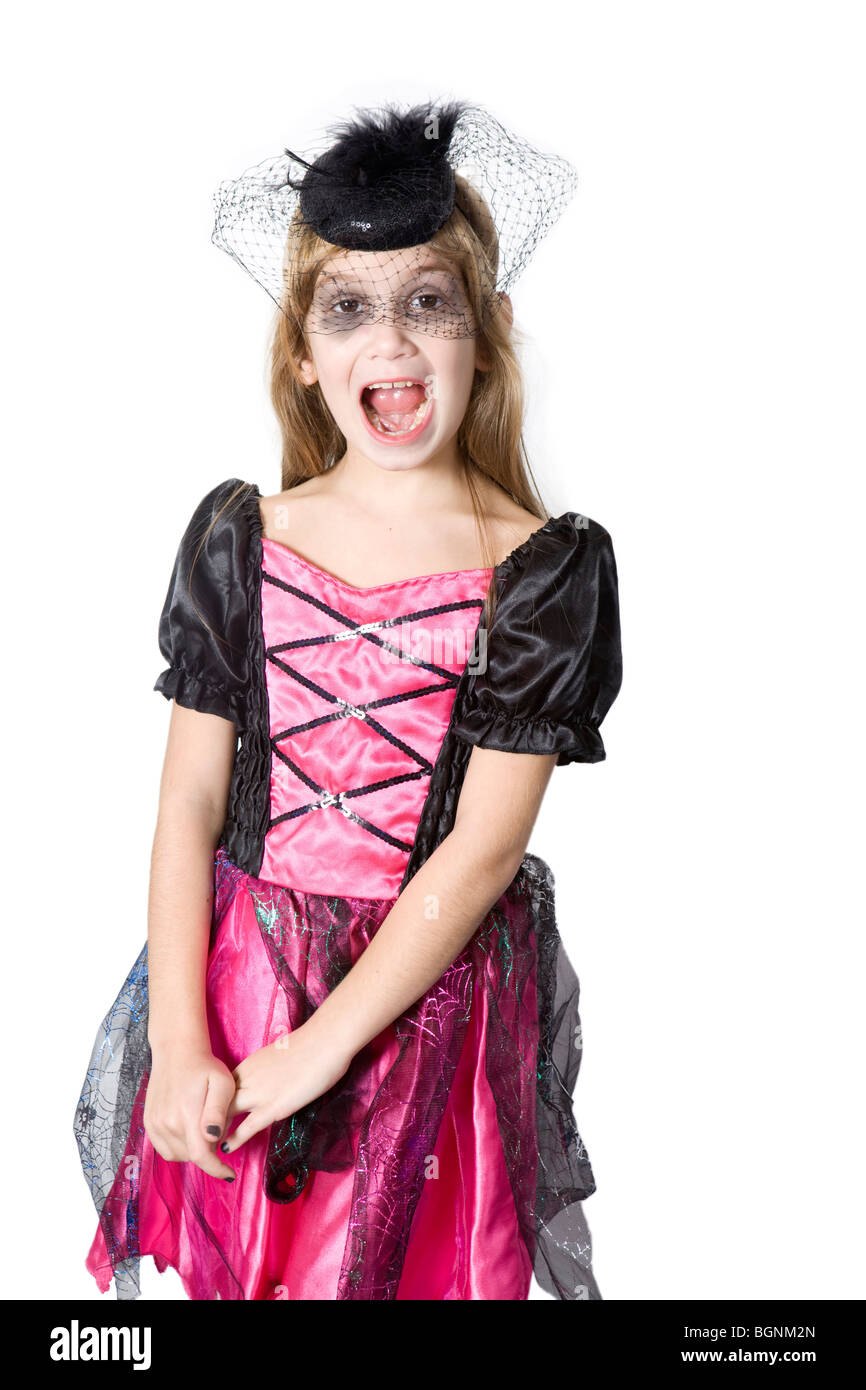 Petite fille mignonne dans Fancy Dress Carnival à la veille de l'Halloween Banque D'Images