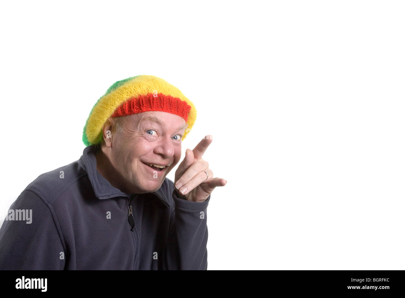 Silly old man wearing clown bonnet rasta. Banque D'Images