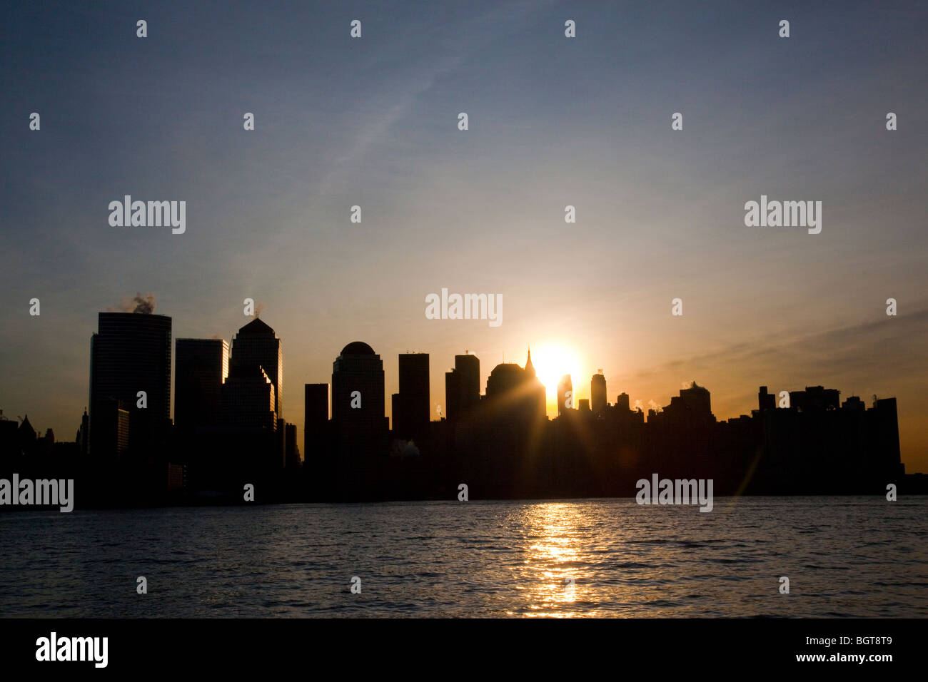 Lever du soleil dans le lower Manhattan, New York City Banque D'Images