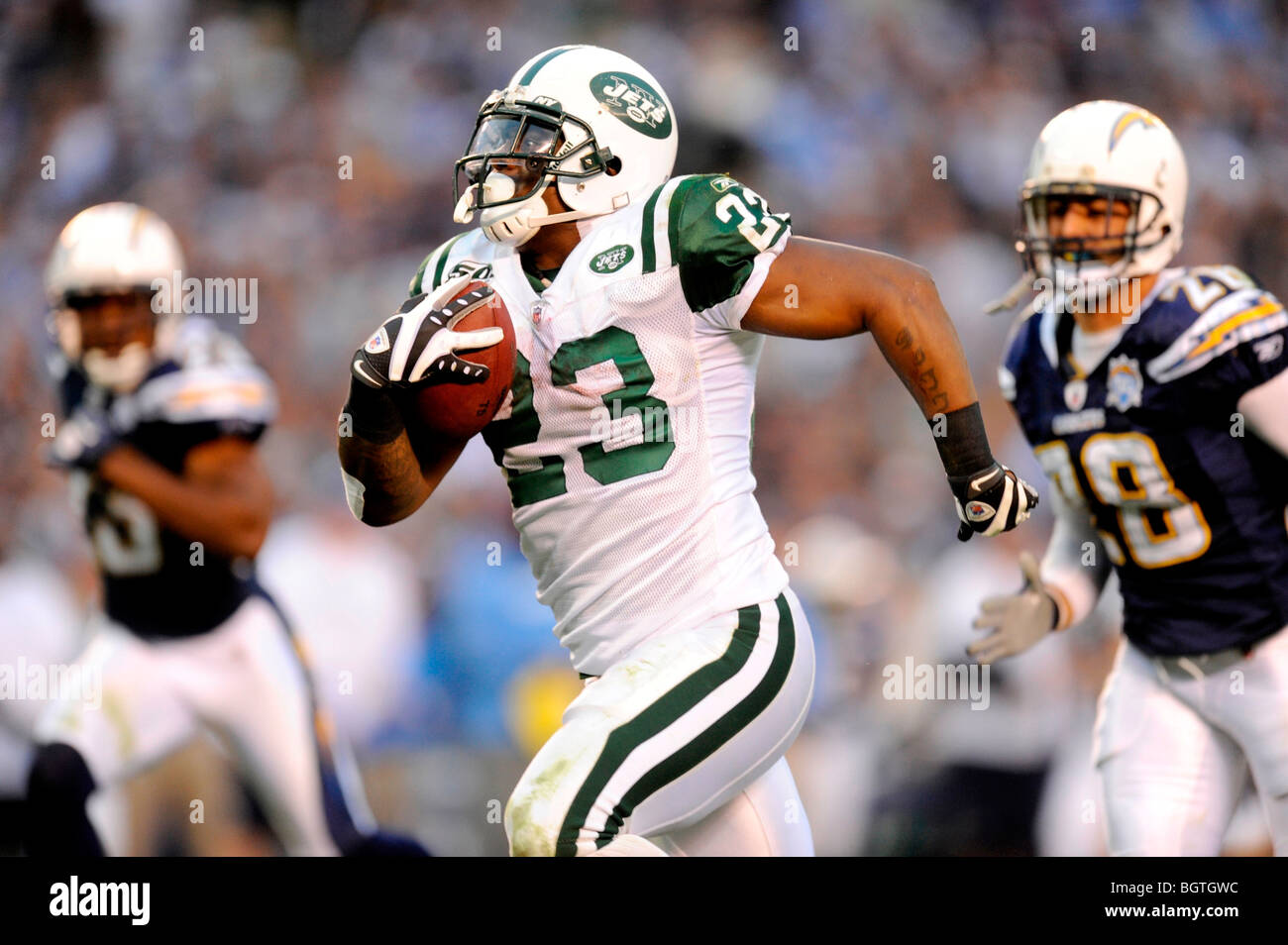 Shonn Greene # 23 de la New York Jets s'exécute pour un touché Banque D'Images