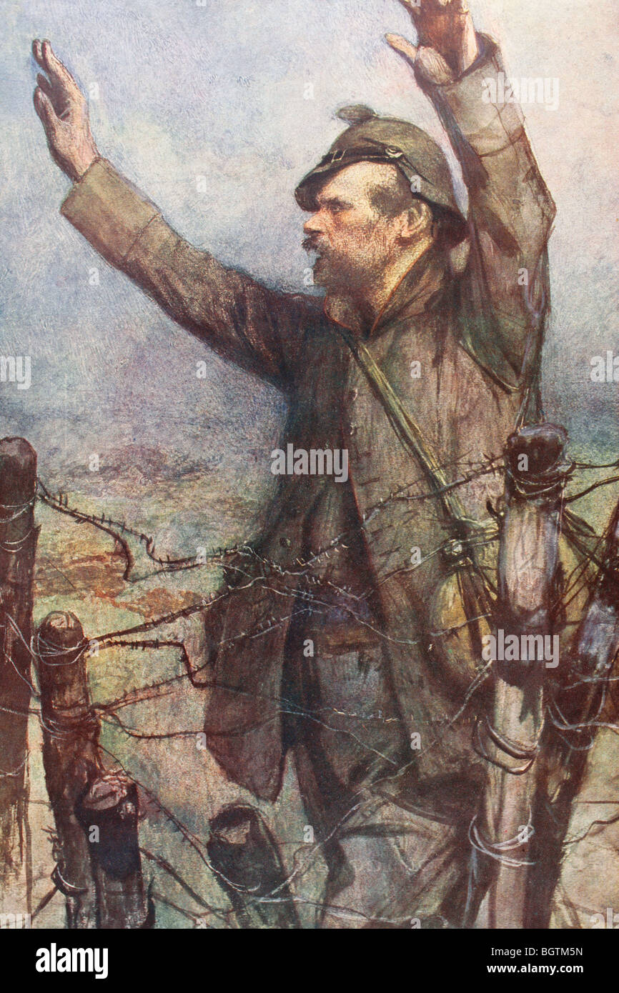 Un soldat allemand avec ses mains en l'air se rend sur le champ de bataille. Banque D'Images