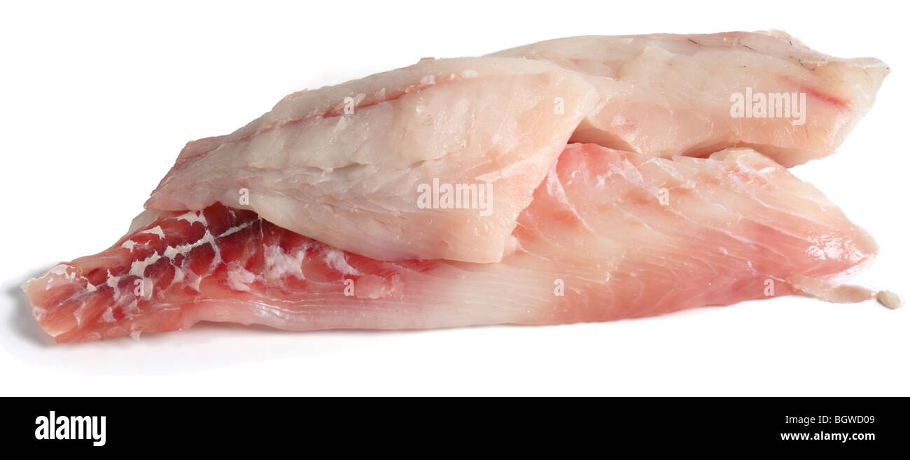 Couper les filets de l'hamour, l'un des poissons de la famille des mérous Banque D'Images