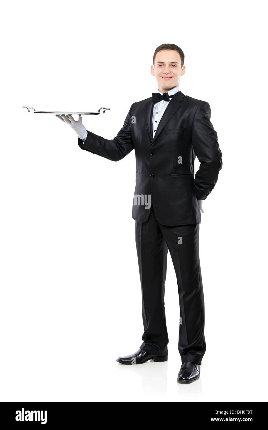 Butler holding a silver tray isolé sur fond blanc Banque D'Images