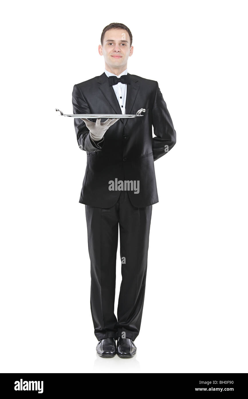 Butler holding a silver tray isolé sur fond blanc Banque D'Images