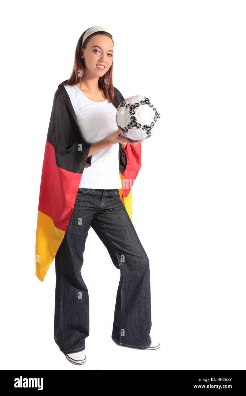 Un fan de football allemand portant plusieurs ustensiles de ventilateur et la tenue d'un ballon de soccer. Tous isolé sur fond blanc. Banque D'Images