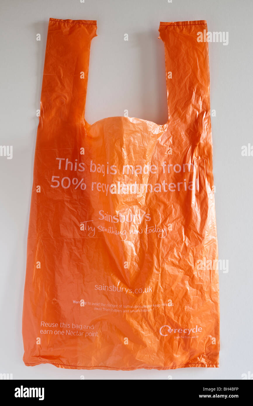 Sainsbury's réutilisables sacs en plastique orange Banque D'Images