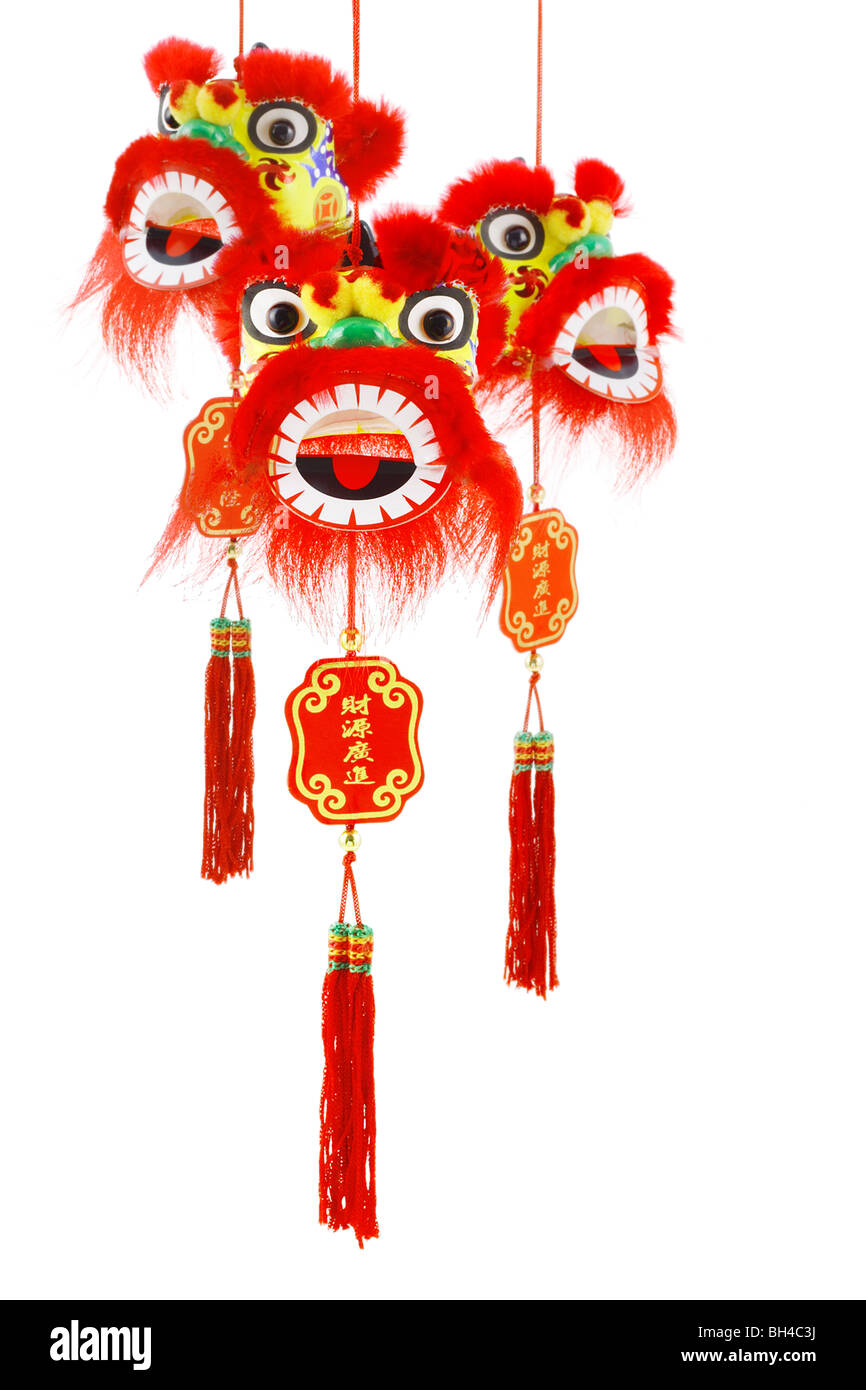 Nouvel an chinois suspendu trois tête de lion ornements sur fond blanc Banque D'Images