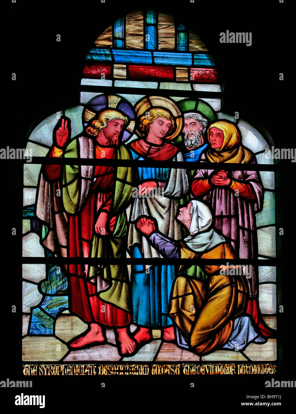 Une fenêtre en vitraux conçue par Horatio Walter Lonsdale représentant Jésus qui jette le diable du Syrphénien, l'Église du Christ Consoler Banque D'Images