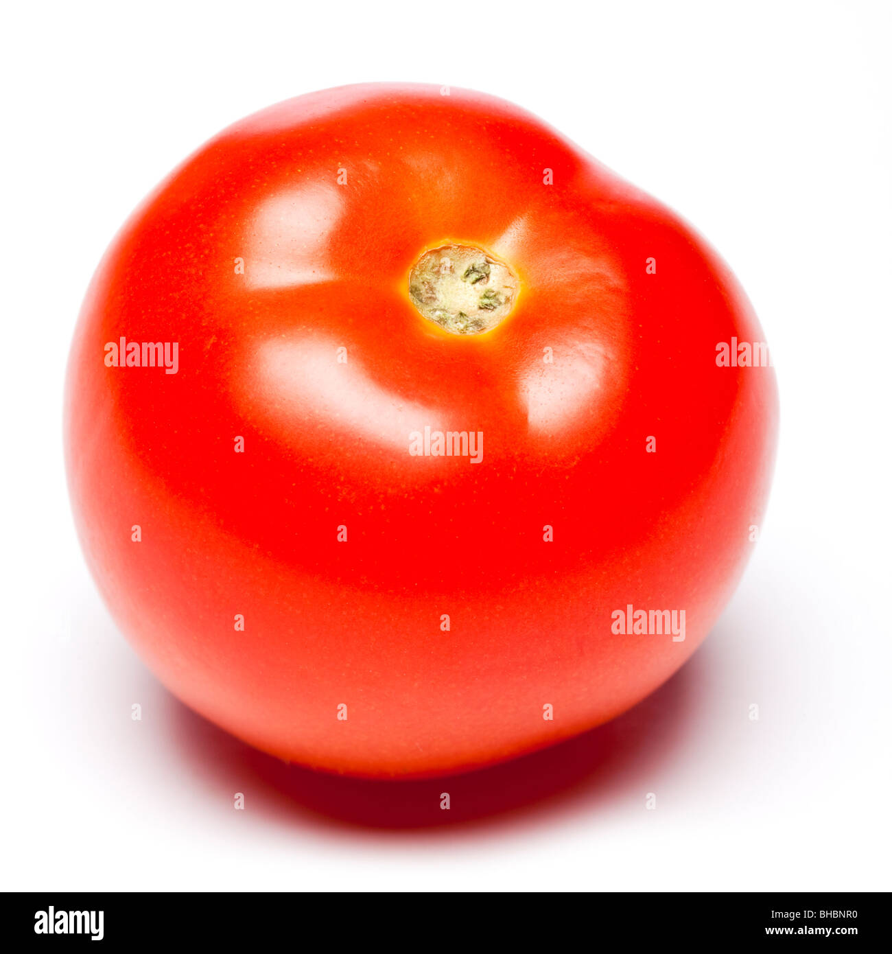 Tomato on white background, studio Banque D'Images
