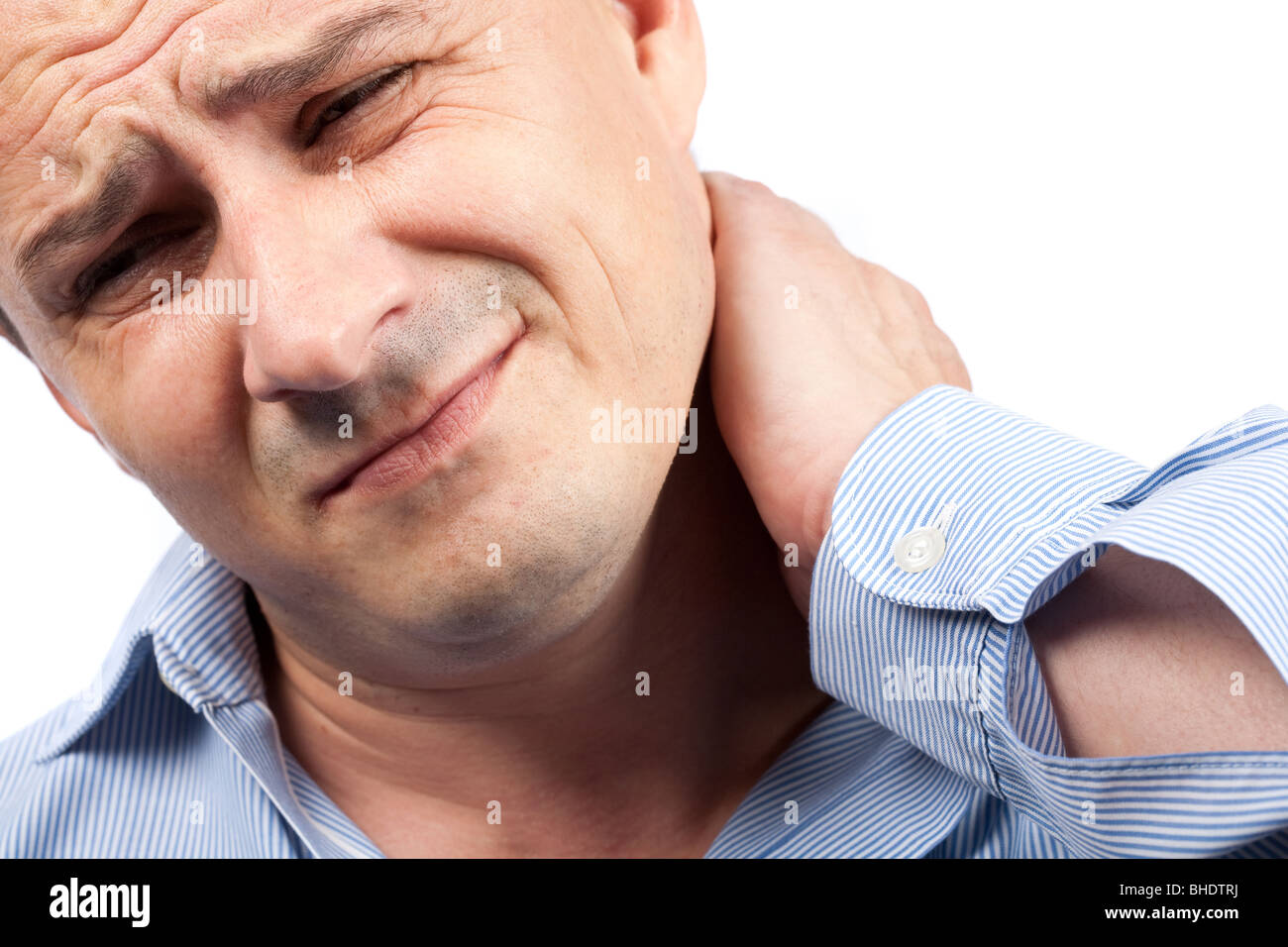 Close up portrait of a young businessman avec douleur au cou Banque D'Images