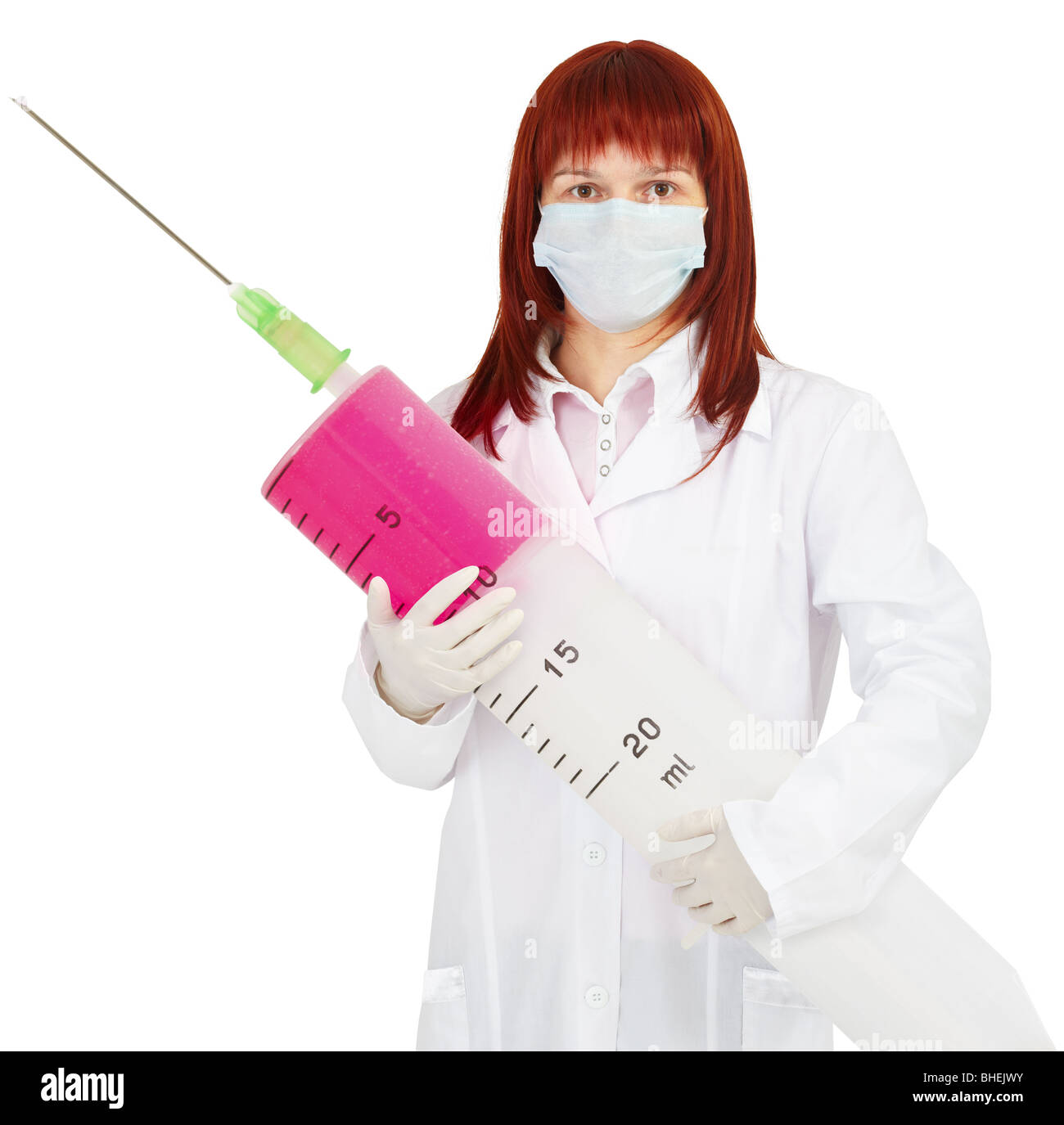 Une jeune femme médecin avec grande seringue dans ses mains Photo Stock -  Alamy