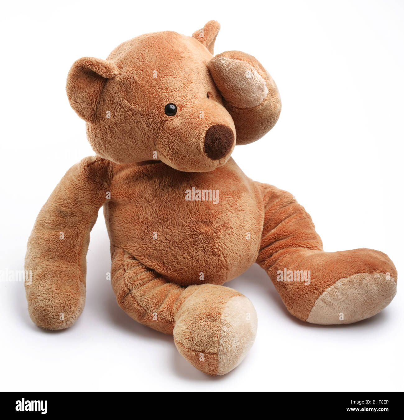 Ours en peluche dans un souci. Isolated over white. Banque D'Images